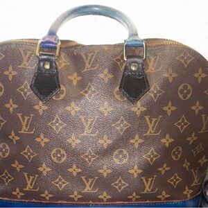 Louis Vuitton Brown and Blue Alma Monogram Bag. Authenticity include. As-is sale